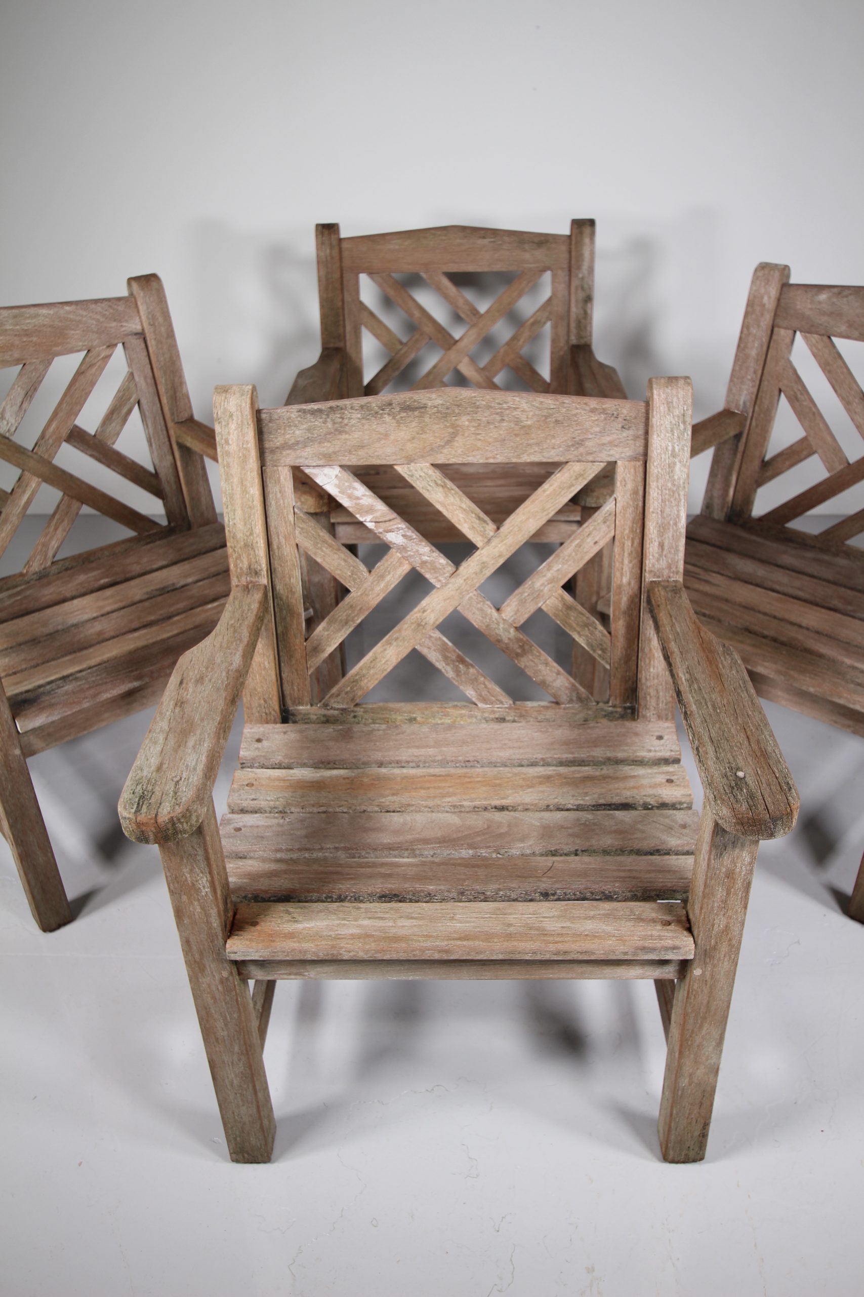 Set of Four 1950’s Lister Teak Chinese Chippendale Garden Armchairs